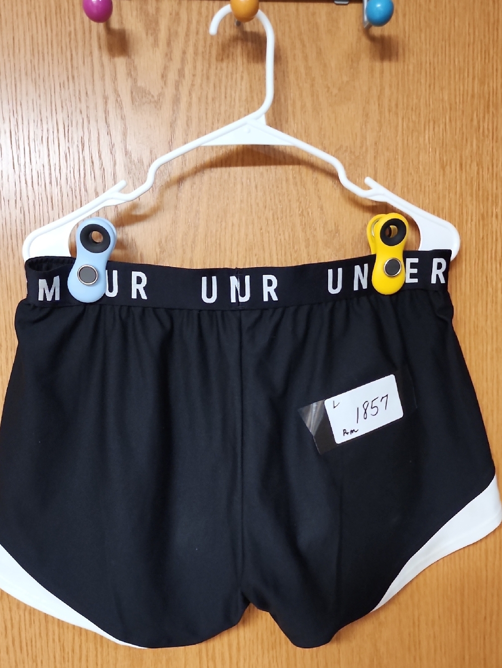Under Armour Black athletic shorts with White Trim womens L number 1857